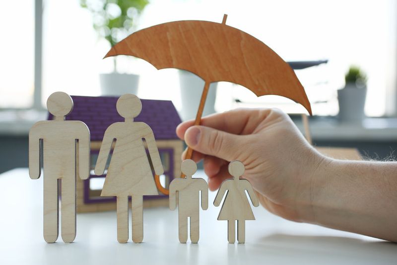 family under an umbrella