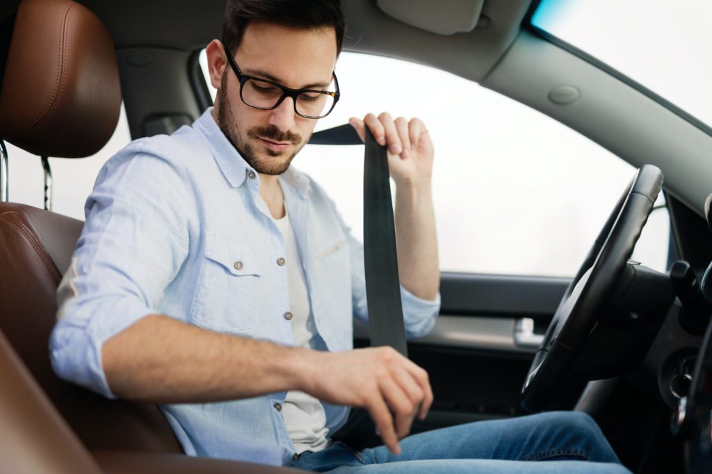 Fasten the car seat belt. Safety belt safety first while driving