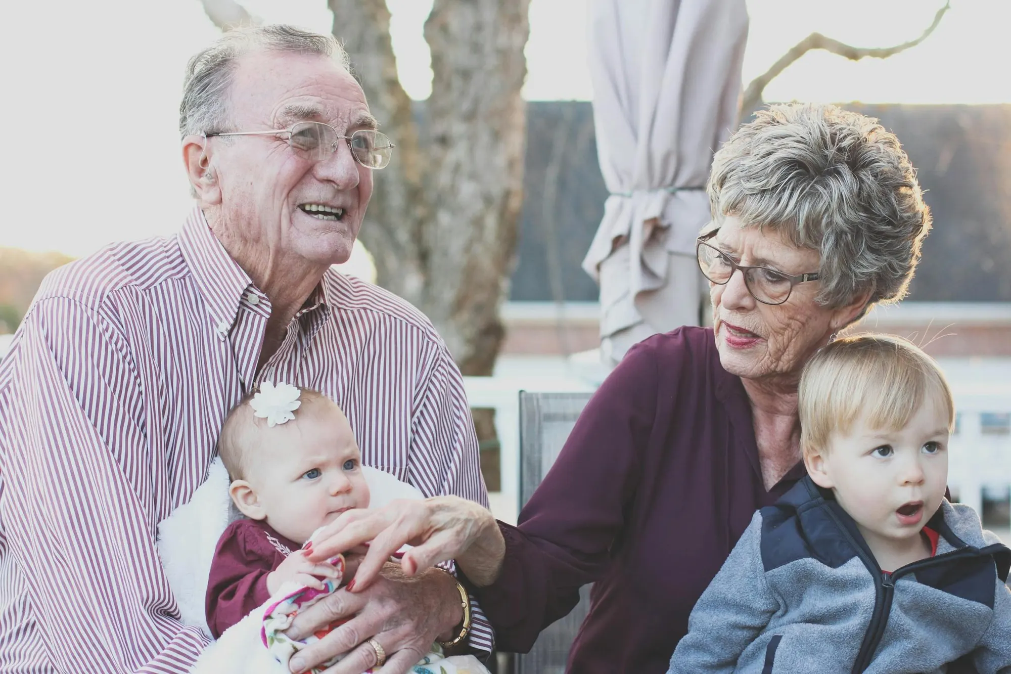 multi generational family of grandparents and babies